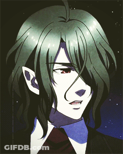 A Man With Long Green Hair And Red Eyes GIF