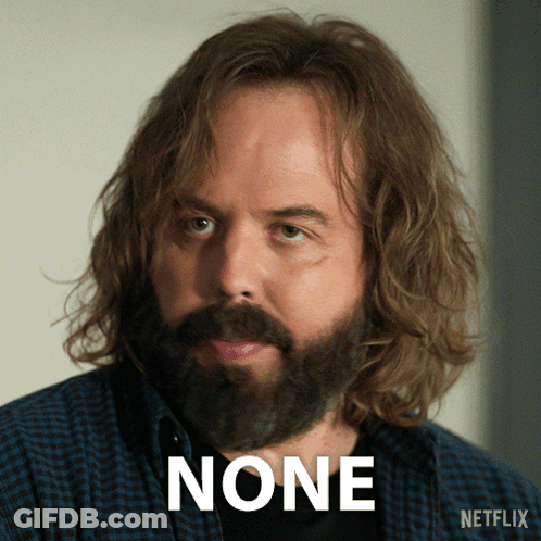 A Man With Long Hair And A Beard Has The Word None Above His Face GIF