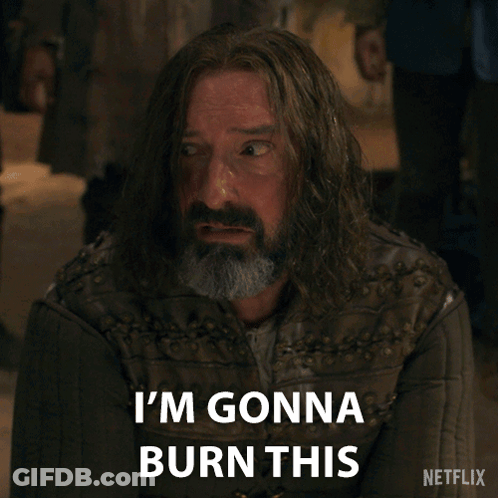 A Man With Long Hair And A Beard Has The Words Place To The Ground Written On His Face GIF