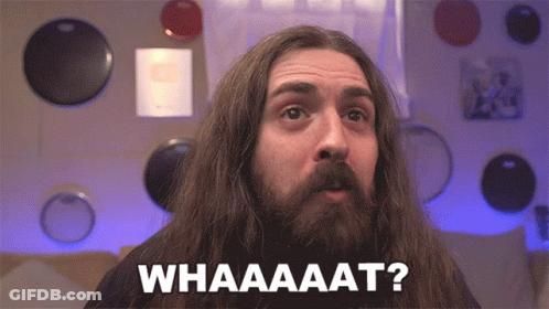 A Man With Long Hair And A Beard Is Asking The Question Whaaaaat GIF