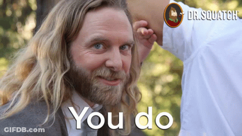 A Man With Long Hair And A Beard Is Being Touched By Another Man 'S Hand And The Words You Do Are Visible GIF