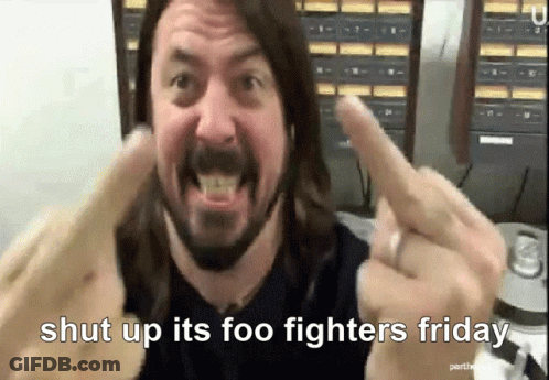 A Man With Long Hair And A Beard Is Giving The Middle Finger With The Words Shut Up Its Foo Fighters Friday Below Him GIF