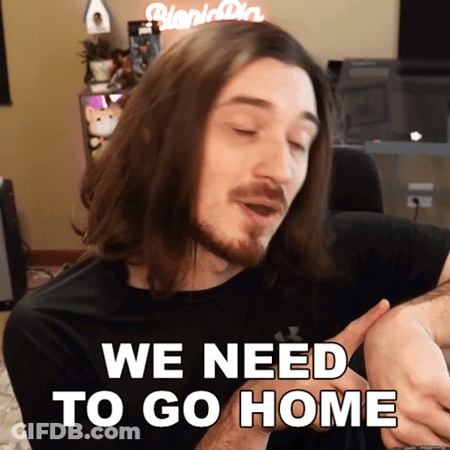 A Man With Long Hair And A Beard Is Holding A Baby And Says We Need To Go Home GIF