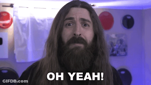 A Man With Long Hair And A Beard Is Making A Funny Face And Saying `` Oh Yeah '' . GIF