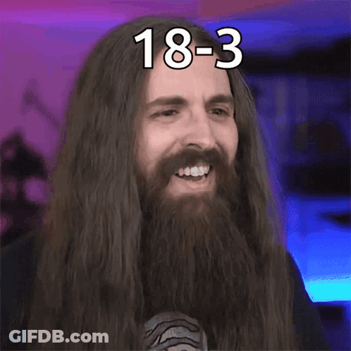 A Man With Long Hair And A Beard Is Making A Funny Face And Says 18-3 Damn GIF