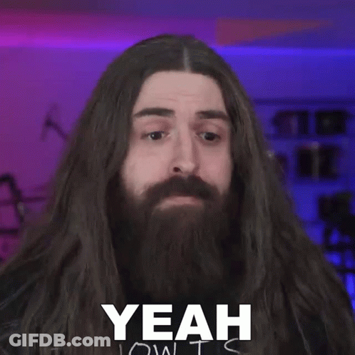 Man With Long Hair And Beard Making Funny Face GIF