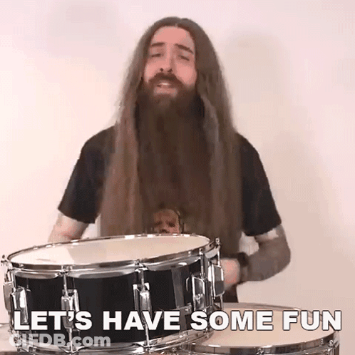 Man With Long Hair And Beard Playing Drums GIF