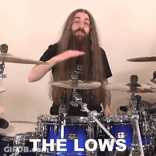 Man With Long Hair And Beard Playing Drums GIF