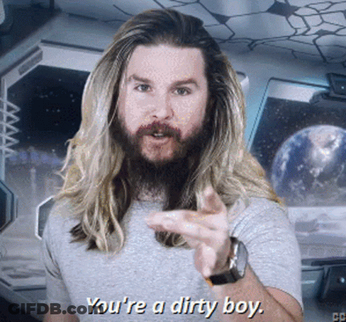A Man With Long Hair And A Beard Is Pointing At The Camera And Saying You 'Re A Dirty Boy GIF