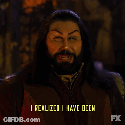 A Man With Long Hair And A Beard Is Saying " Completely Ruining My Life " GIF