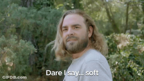 A Man With Long Hair And A Beard Is Saying `` Dare I Say ... Soft '' . GIF