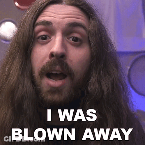 A Man With Long Hair And A Beard Is Saying " I Was Blown Away " GIF