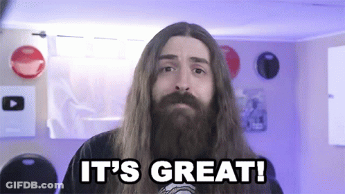 A Man With Long Hair And A Beard Is Saying " It 'S Great " GIF