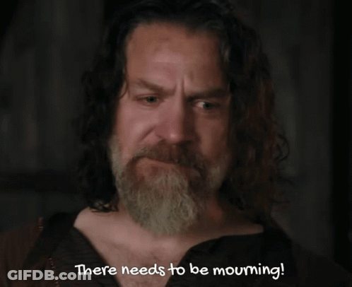 A Man With Long Hair And A Beard Is Saying There Needs To Be Mourning GIF