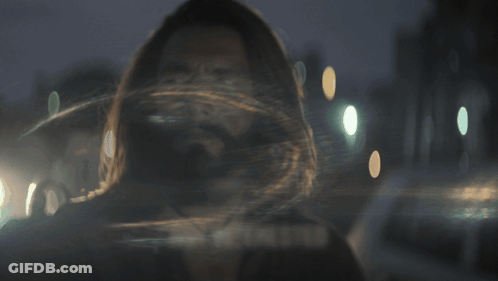 A Man With Long Hair And A Beard Is Shown With The Words Not Interested Below Him GIF