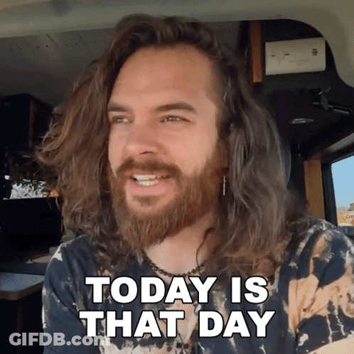 A Man With Long Hair And A Beard Is Sitting In A Car And Says Today Is That Day GIF