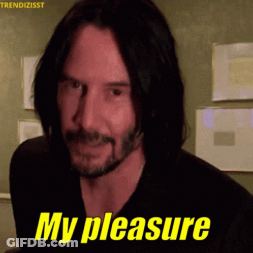 A Man With Long Hair And A Beard Is Smiling And Says My Pleasure GIF