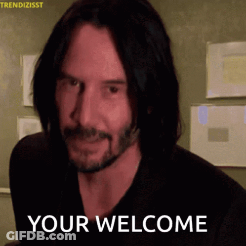A Man With Long Hair And A Beard Is Smiling And Says " Your Welcome " GIF