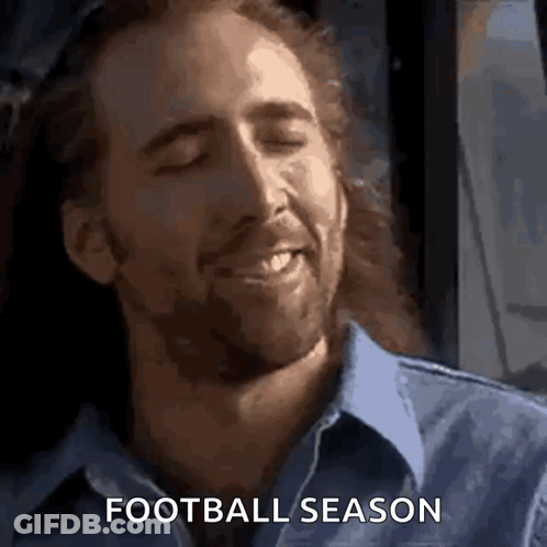A Man With Long Hair And A Beard Is Smiling With His Eyes Closed And The Words `` Football Season '' Written Below Him . GIF