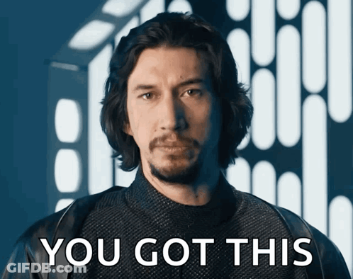 A Man With Long Hair And A Beard Is Standing In Front Of A Sign That Says " You Got This " GIF