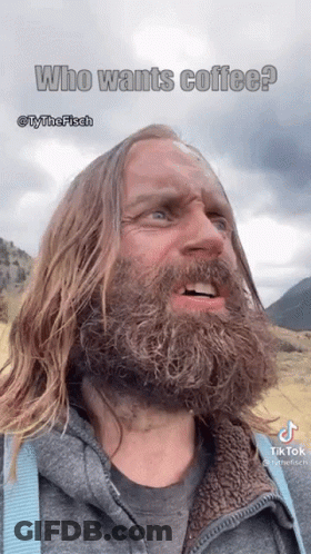 A Man With Long Hair And A Beard Is Talking About Coffee GIF