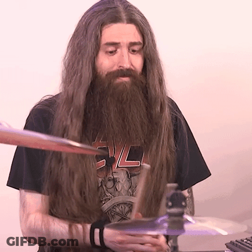 Man With Long Hair And Beard Wearing SL Shirt GIF