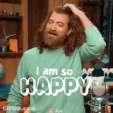 A Man With Long Hair And A Beard Is Wearing A Sweater That Says I Am So Happy GIF