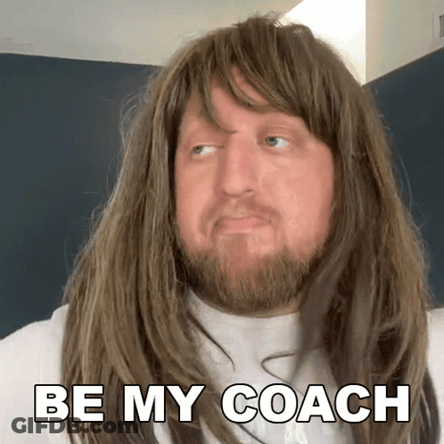 A Man With Long Hair And A Beard Is Wearing A Wig And Says Be My Coach GIF