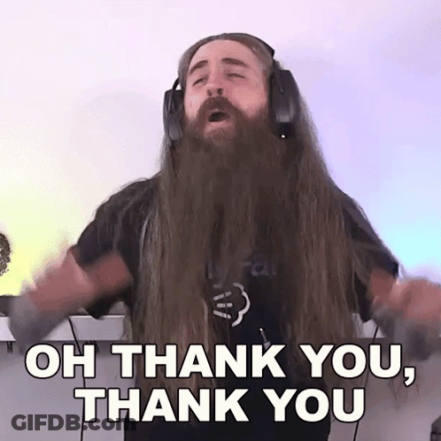 A Man With Long Hair And A Beard Is Wearing Headphones And Saying Oh Thank You Thank You . GIF