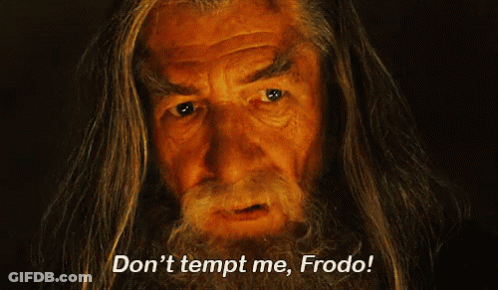 A Man With Long Hair And A Beard Says " Don 'T Tempt Me Frodo " GIF