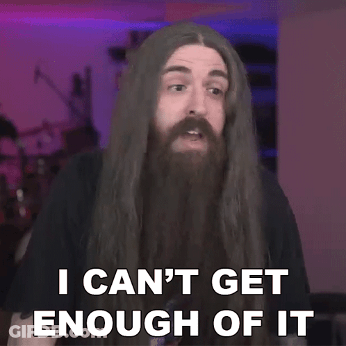 A Man With Long Hair And A Beard Says I Can T Get Enough Of It GIF