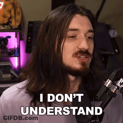 A Man With Long Hair And A Beard Says I Don 'T Understand In Front Of A Microphone GIF