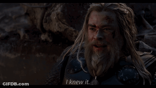 A Man With Long Hair And A Beard Says " I Knew It " In A Movie Scene GIF