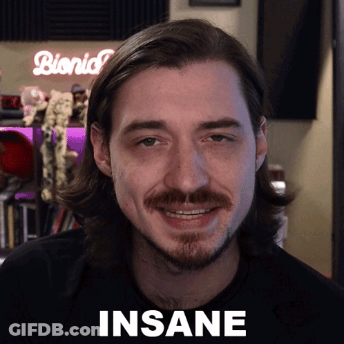 Man With Long Hair And Beard Saying Insane GIF