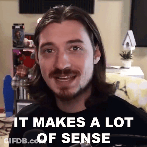 A Man With Long Hair And A Beard Says " It Makes A Lot Of Sense " In Front Of A Microphone GIF