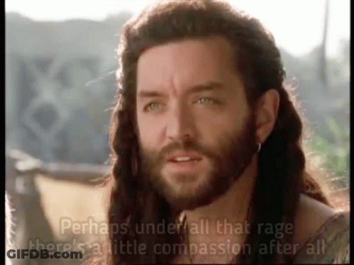 A Man With Long Hair And A Beard Says " Perhaps Under All That Rage There Is A Little Compassion After All " GIF