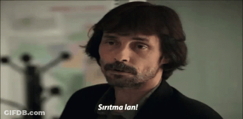 A Man With Long Hair And A Beard Says " Sirtma Lan " GIF