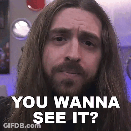 A Man With Long Hair And A Beard Says You Wanna See It ? GIF