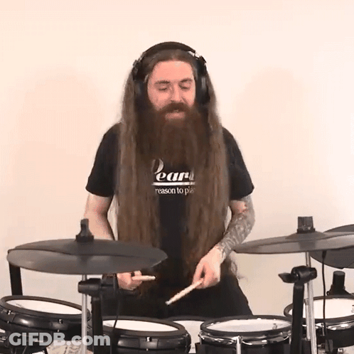 Man With Long Hair And Beard Playing Drums GIF