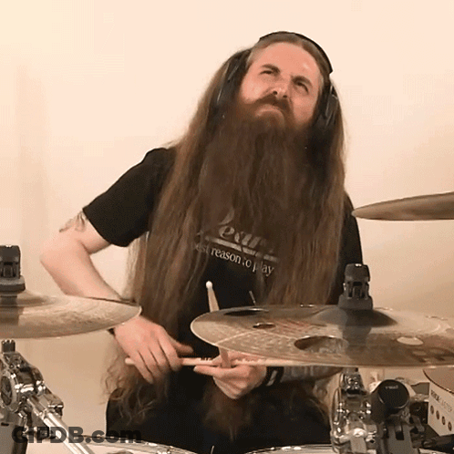 Man With Long Hair And Beard Wearing Out Shirt GIF