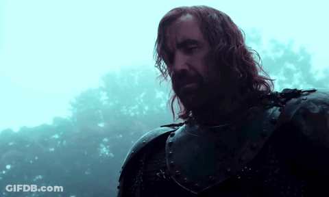 A Man With Long Hair And A Beard Wearing Armor GIF