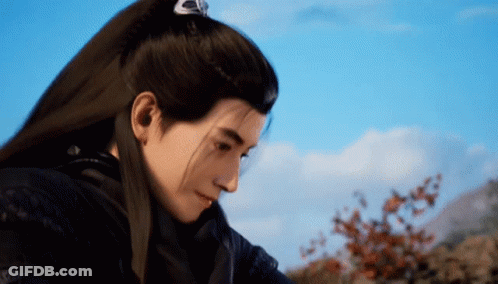 A Man With Long Hair And A Crown On His Head Is Looking Down GIF