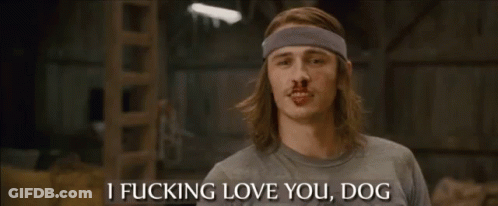 A Man With Long Hair And A Headband Says I Fucking Love You Dog . GIF