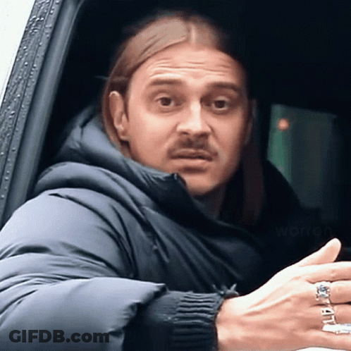 Man With Long Hair And Mustache Wearing Warren Ring GIF