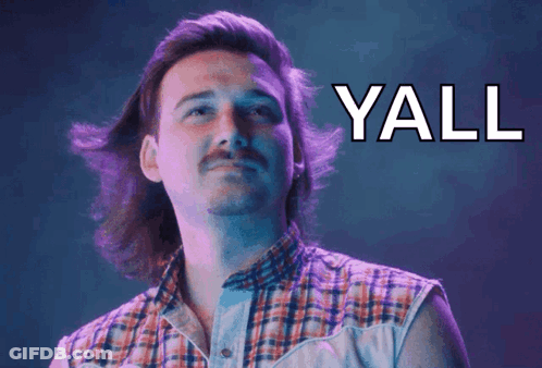 A Man With Long Hair And A Mustache Says Yall GIF