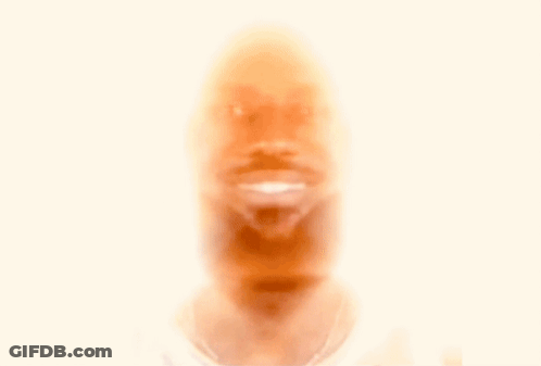 A Man With Long Hair And A Nfl Logo On His Neck GIF