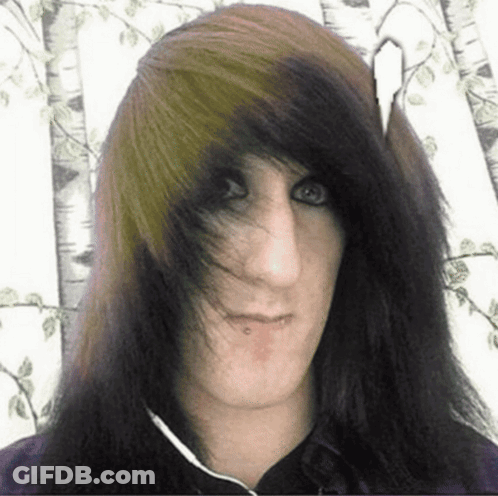 A Man With Long Hair And A Nose Piercing GIF