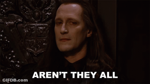 A Man With Long Hair Has The Words Aren 'T They All Below Him GIF