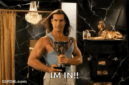 A Man With Long Hair Is Holding A Trophy In A Bathroom . GIF