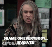 A Man With Long Hair Is Making A Funny Face And Saying `` Shame On Everybody Involved '' . GIF